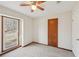 This is a neutral bedroom featuring carpet flooring and a window with outdoor view at 489 Natasha Dr, Auburn, GA 30011