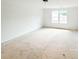 Bright bedroom featuring a window providing plenty of natural light, perfect for relaxation at 1269 Pj East Rd, Covington, GA 30014
