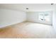 Well-lit bedroom featuring a large window providing ample natural light, offering a peaceful retreat at 1269 Pj East Rd, Covington, GA 30014