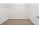 Walk-in closet with carpet flooring and wire shelving for maximum storage at 1269 Pj East Rd, Covington, GA 30014