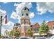 Historic courthouse featuring a clock tower, brick facade, and classic architecture with American flag at 1269 Pj East Rd, Covington, GA 30014