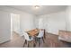 Dining area off of bathroom shows access to other rooms, carpet floor, and dining set at 1269 Pj East Rd, Covington, GA 30014