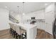 Bright, modern kitchen with a large island, stainless steel appliances, and white cabinetry at 1269 Pj East Rd, Covington, GA 30014