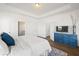 View of a main bedroom with a trey ceiling, a TV on the dresser and ensuite bath at 1269 Pj East Rd, Covington, GA 30014