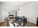 Stylish home office with a modern chandelier and a large desk at 1269 Pj East Rd, Covington, GA 30014