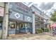 Charming storefront featuring Fletcher's Jewelry and an adjacent building with outdoor seating and landscaping at 1269 Pj East Rd, Covington, GA 30014