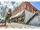 Charming brick building featuring Kuter's Cage barber shop with an inviting storefront and classic architectural details at 1269 Pj East Rd, Covington, GA 30014