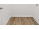 A walk-in closet boasts wood floors, white walls and trim, and wire shelving at 1269 Pj East Rd, Covington, GA 30014