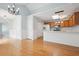 Open floor plan featuring hardwood floors, bright kitchen, and two closets at 134 Rose Cottage Ln, Woodstock, GA 30189