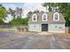 Charming pool house with accessible parking space near the community pool at 134 Rose Cottage Ln, Woodstock, GA 30189