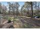 Spacious backyard with mature trees at 3948 Lake Carlton Road S Rd, Loganville, GA 30052