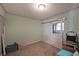 Small laundry room with sliding barn door, carpet, and light green paint at 3948 Lake Carlton Road S Rd, Loganville, GA 30052