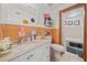 Well-lit bathroom featuring tile and a vanity with plenty of counter space at 4648 Danna Dr, Austell, GA 30106