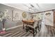 Inviting dining room featuring a large table with seating for six and barn doors at 4648 Danna Dr, Austell, GA 30106