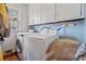 Laundry room featuring a washer and dryer and ample storage at 4648 Danna Dr, Austell, GA 30106