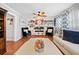 Bright and inviting living room with built-in shelving, hardwood floors, and stylish decor at 4648 Danna Dr, Austell, GA 30106