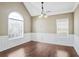 Bright dining room with hardwood floors, wainscoting, and natural light at 494 Martin Forest Ln, Lawrenceville, GA 30045