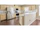 Bright kitchen with stainless steel appliances and lots of cabinet space at 494 Martin Forest Ln, Lawrenceville, GA 30045