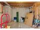 Unfinished basement storage area with exposed ceiling and concrete walls at 7270 Sheffield Pl, Cumming, GA 30040