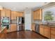 Kitchen with stainless appliances, granite countertops, and plenty of cabinet space at 7270 Sheffield Pl, Cumming, GA 30040