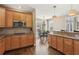 Well-appointed kitchen with granite counters and an eat-in dining area at 7270 Sheffield Pl, Cumming, GA 30040