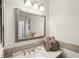 Bright bathroom with a large mirror, decorative light fixture, and clean countertops at 101 Natchez Trce, Atlanta, GA 30350