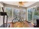 Sunroom with lots of natural light and view of the backyard at 101 Natchez Trce, Atlanta, GA 30350