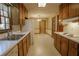 Functional kitchen with ample cabinet space and white appliances at 4042 Shady Nw Cir, Lilburn, GA 30047