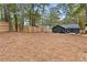 Large backyard with a house and deck at 410 Wilkinson Se Dr, Atlanta, GA 30317