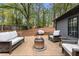 Backyard featuring deck, fire pit, chairs and outdoor space at 410 Wilkinson Se Dr, Atlanta, GA 30317