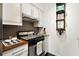 Efficient kitchen setup with essential appliances, designed for convenient cooking and storage at 1421 Peachtree Ne St # 415, Atlanta, GA 30309