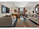 Bright living room with modern lighting, offering comfortable seating and stylish decor at 1421 Peachtree Ne St # 415, Atlanta, GA 30309