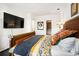 Cozy main bedroom featuring luxury bedding and adjacent walk-in closet at 1421 Peachtree Ne St # 415, Atlanta, GA 30309