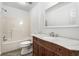 Bathroom featuring detailed vanity and bathtub with shower at 2113 Pine Tree Trl, Atlanta, GA 30349