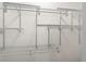 Walk-in closet system with metal racks and bars for plenty of storage at 2113 Pine Tree Trl, Atlanta, GA 30349