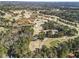 Aerial view of the golf course community, highlighting its lush landscaping and scenic beauty at 4178 Castle Pines Ct, Tucker, GA 30084