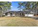 Well-maintained single story home with fresh exterior paint, windows and manicured front lawn at 4178 Castle Pines Ct, Tucker, GA 30084