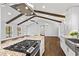 Spacious kitchen with granite countertops, gas cooktop, and an open layout at 4178 Castle Pines Ct, Tucker, GA 30084