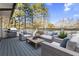 Outdoor patio with comfortable seating and a grill, ideal for relaxing or entertaining at 4178 Castle Pines Ct, Tucker, GA 30084