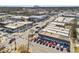 A lively commercial street with storefronts and parked cars under a blue sky at 4178 Castle Pines Ct, Tucker, GA 30084