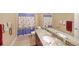 Bathroom featuring a granite countertop, and coordinated towel set at 970 Prance Dr, Kennesaw, GA 30144