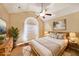 Relaxing bedroom with a wooden bed frame, neutral decor, and natural light at 970 Prance Dr, Kennesaw, GA 30144