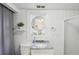 Bathroom featuring a tub/shower with gray tile and granite vanity at 313 5Th Ne St, Atlanta, GA 30308