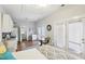 Bright living space features a bed, kitchen, and dining area, creating a modern and functional open-concept design at 313 5Th Ne St, Atlanta, GA 30308