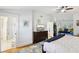 Spacious main bedroom featuring a bathroom, TV, and cozy window seat, creating a luxurious retreat at 313 5Th Ne St, Atlanta, GA 30308