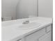 Bathroom featuring white sink, countertop, and a large mirror at 5940 Hampton Ct, Atlanta, GA 30349