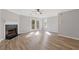 Spacious living room features new flooring and fireplace with backyard access at 5940 Hampton Ct, Atlanta, GA 30349