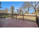 Backyard features a spacious wood deck with black metal balusters at 9515 Deerfield Ln, Jonesboro, GA 30238