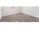 Bedroom featuring carpet, natural light, and neutral walls, perfect for relaxing at 9515 Deerfield Ln, Jonesboro, GA 30238