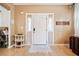 Inviting foyer with hardwood floors, a classic white door, and ample natural light creating a warm welcome at 1000 Beckwith Sw St, Atlanta, GA 30314